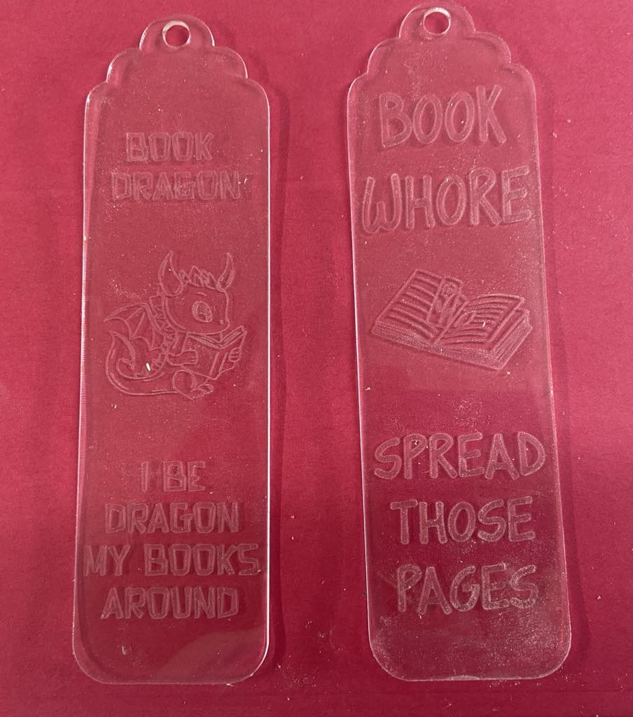 Laser Etch wood or acrylic bookmarks.