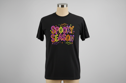 Spooky Season neon retro DTF print with bats and sparkles on black t-shirt